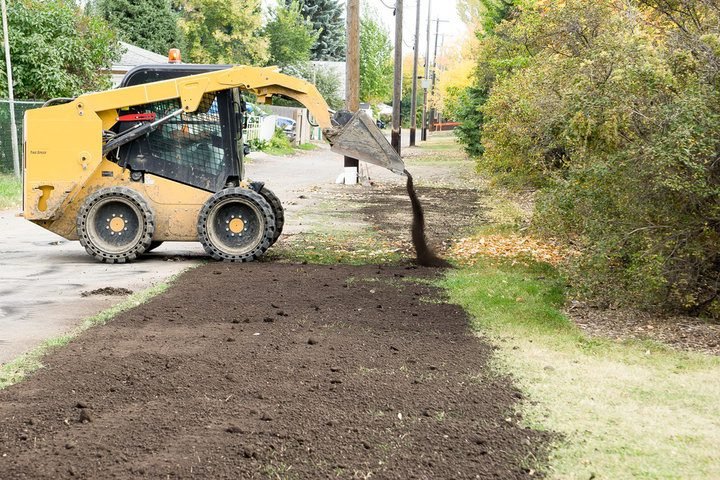 How Topsoil Dressing Revives Thin and Patchy Lawns Best Landscaping Company In Richmond, VA | Lawn Poppers LLC